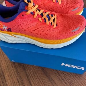 Hoka Orange and Yellow Running Shoes